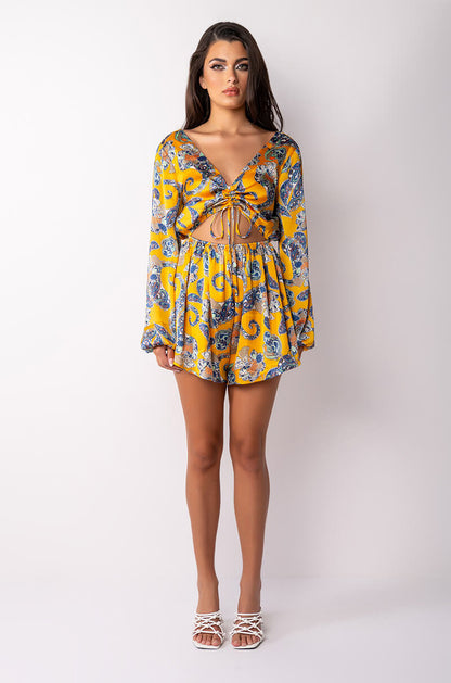 ADMIT IT LONG SLEEVE PRINTED ROMPER WITH CUT OUT