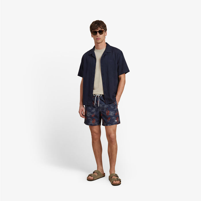Short de bain imprimé dragons Nestor bleu marine
